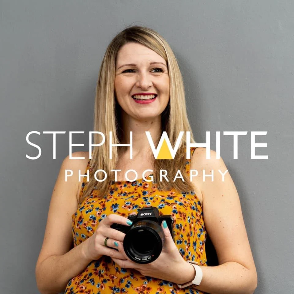 Steph White holding her camera