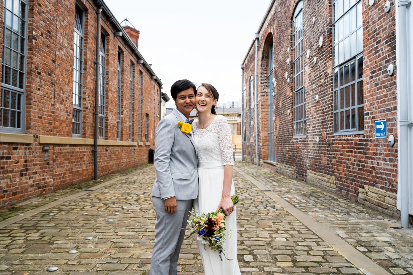 Newlyweds on a cobbled Yorkshire street